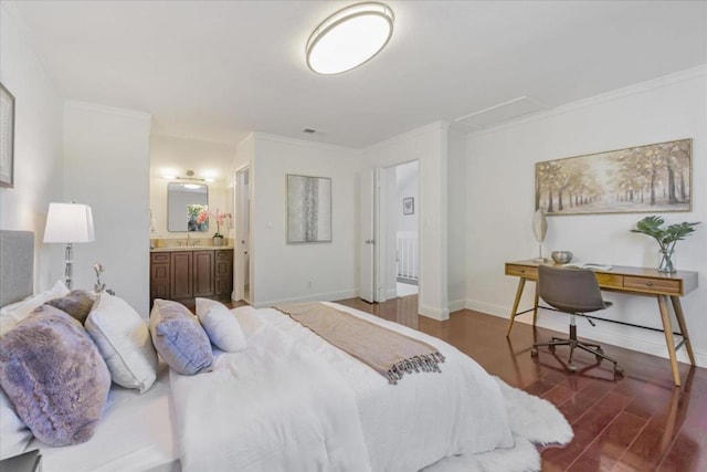 bedroom featuring sink, ensuite bathroom, dark hardwood / wood-style flooring, and crown molding