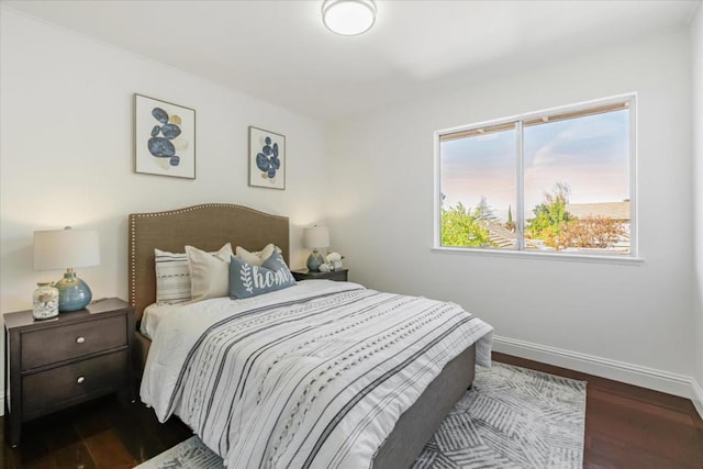 bedroom featuring dark hardwood / wood-style floors