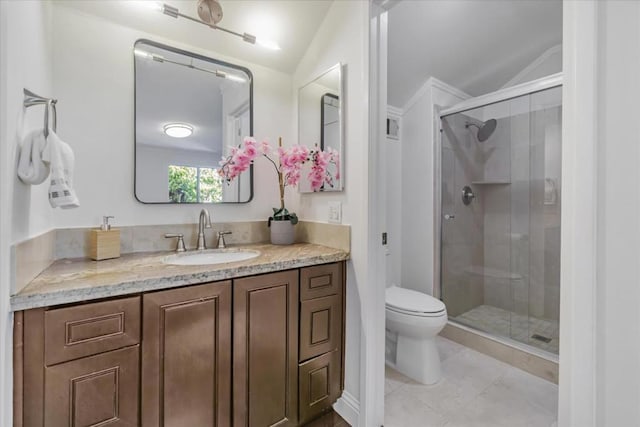 bathroom featuring tile patterned floors, an enclosed shower, vaulted ceiling, toilet, and vanity