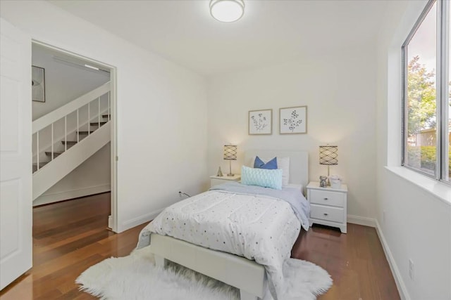 bedroom featuring dark hardwood / wood-style floors