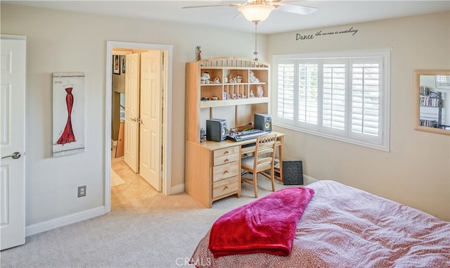 bedroom featuring light carpet and ceiling fan