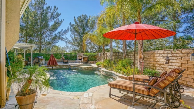 view of swimming pool featuring a patio area