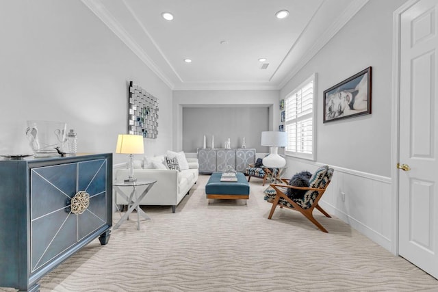 carpeted living room with ornamental molding