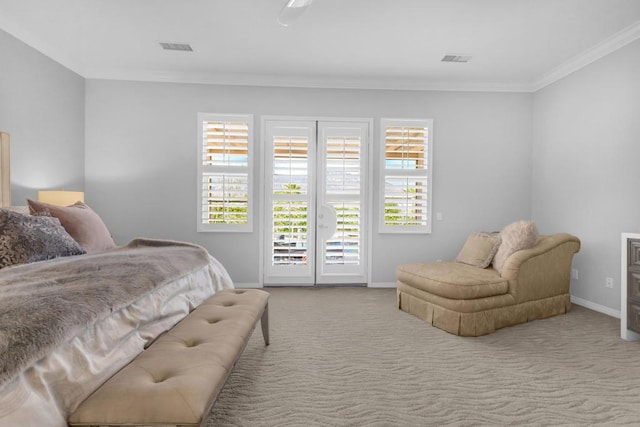 carpeted bedroom featuring access to outside and crown molding