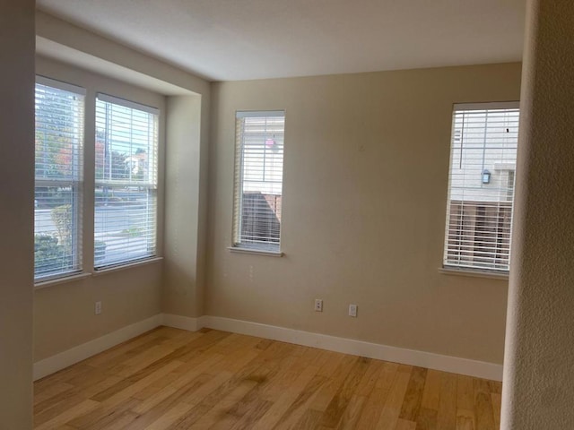 empty room featuring light hardwood / wood-style floors