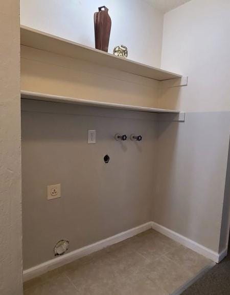 clothes washing area with gas dryer hookup, electric dryer hookup, and washer hookup