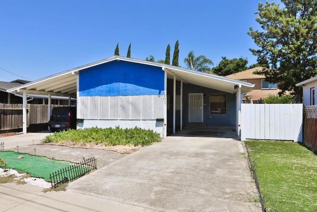 view of front of house with a carport