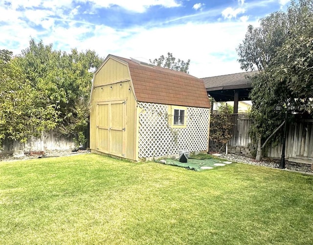 view of outdoor structure with a lawn