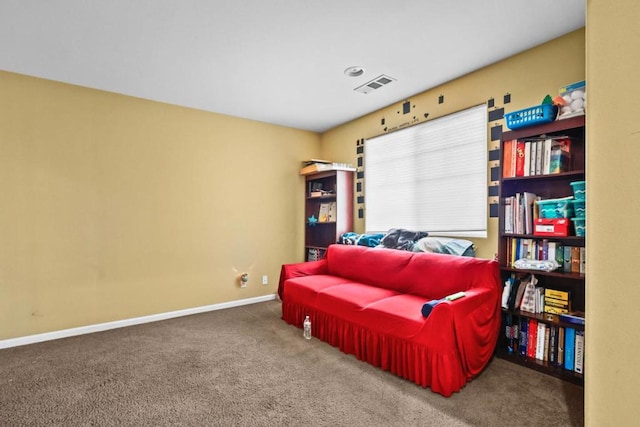 sitting room featuring carpet