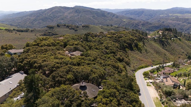 drone / aerial view featuring a mountain view