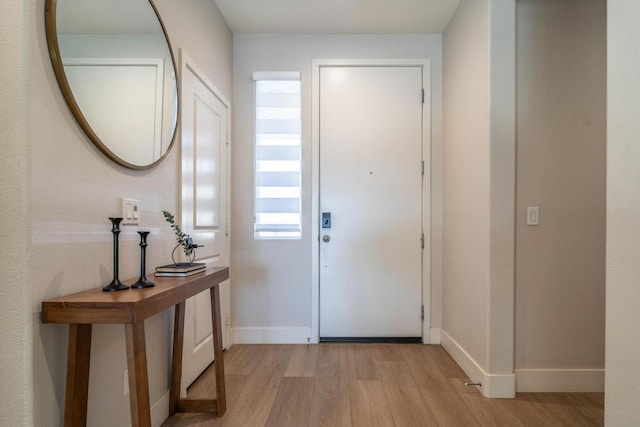 foyer featuring light wood-type flooring