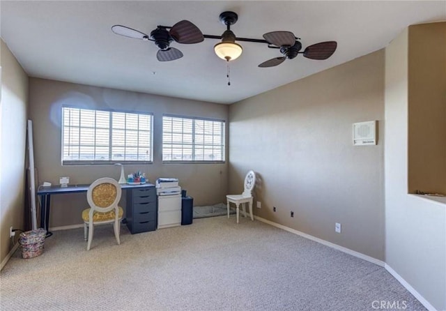 interior space with carpet, ceiling fan, and a wealth of natural light