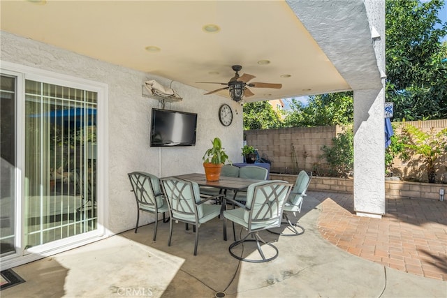 view of patio / terrace featuring ceiling fan