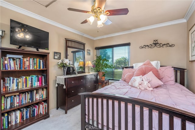 carpeted bedroom with crown molding and ceiling fan