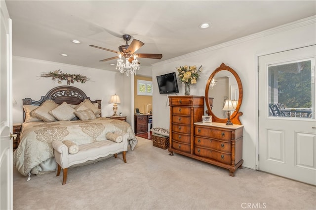 bedroom with ceiling fan, ornamental molding, multiple windows, and light colored carpet