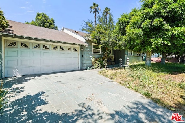 view of front of house with a garage