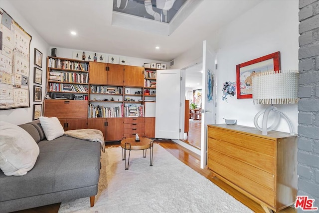 sitting room with light hardwood / wood-style floors