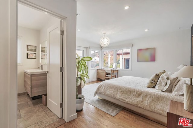 bedroom featuring light hardwood / wood-style floors