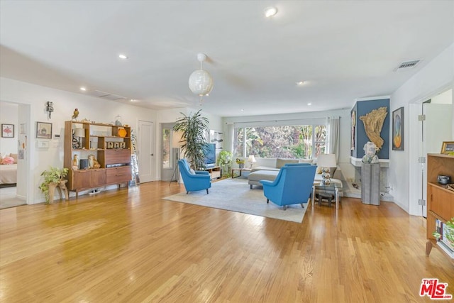 living room featuring light wood-type flooring