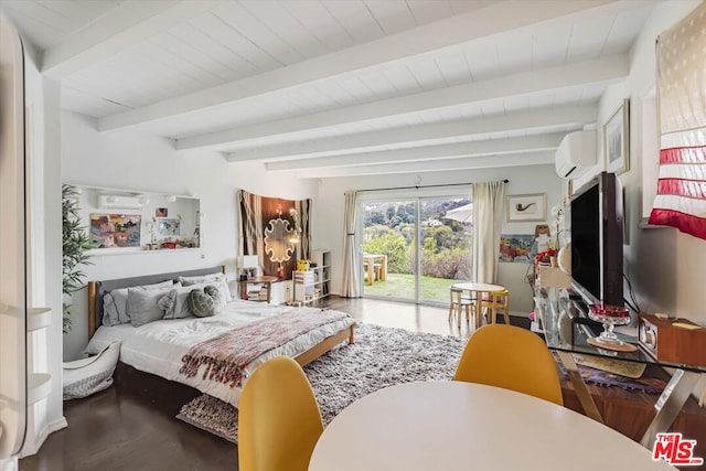 bedroom with beamed ceiling, access to exterior, and a wall mounted air conditioner