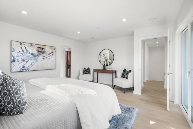 bedroom with light wood-type flooring