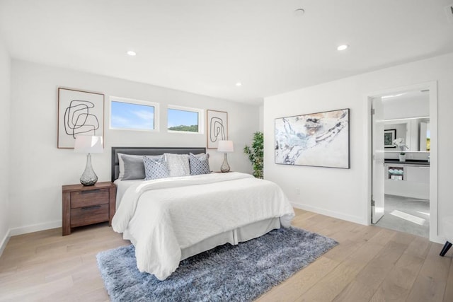 bedroom featuring light wood-type flooring