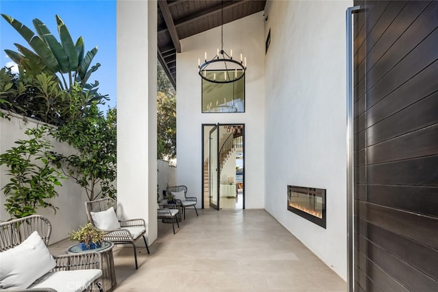 doorway to property featuring a patio area