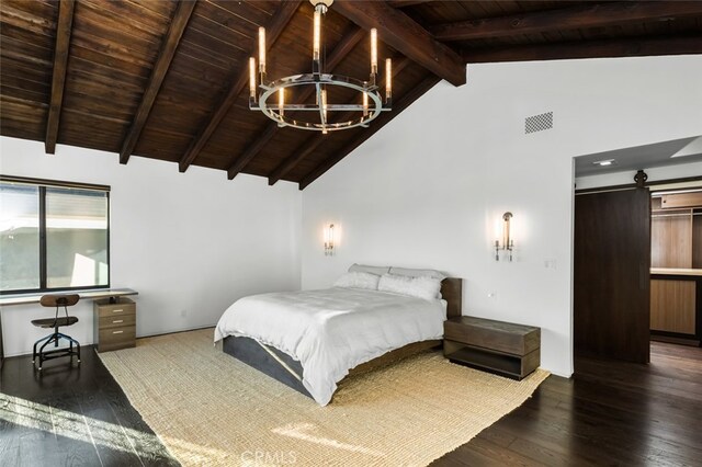 bedroom with dark hardwood / wood-style flooring, beam ceiling, a barn door, an inviting chandelier, and wooden ceiling