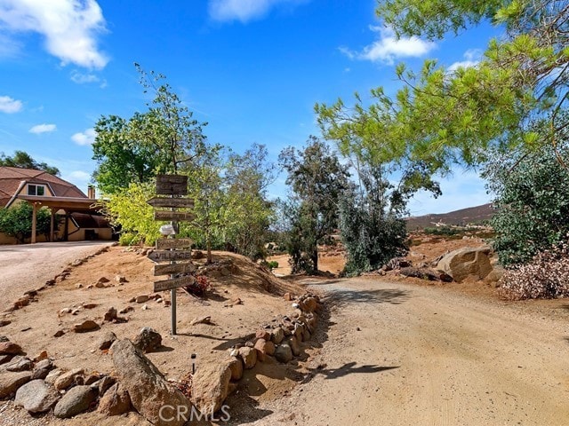 view of yard with a carport