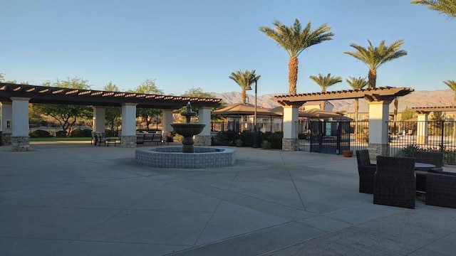 view of property's community with a patio