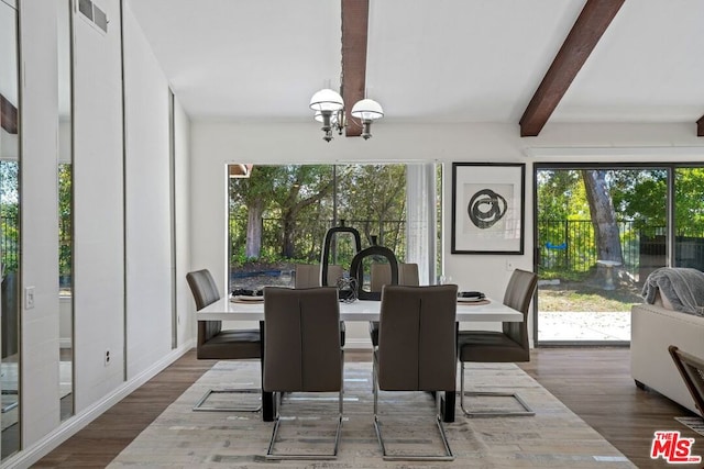 dining area with beamed ceiling, a notable chandelier, and dark hardwood / wood-style floors