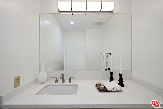 bathroom featuring vanity