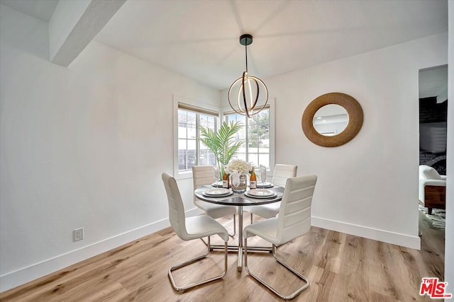 dining area featuring light wood-type flooring