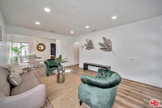 living room with hardwood / wood-style floors