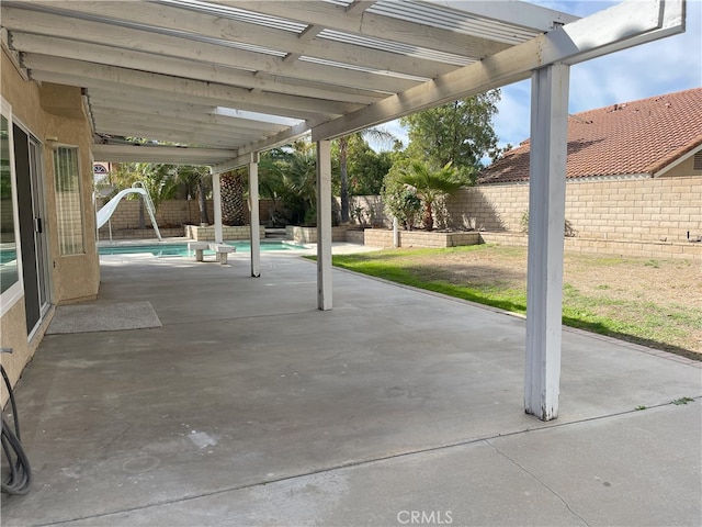 view of patio featuring a pergola and a fenced in pool