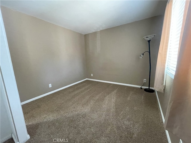 unfurnished room featuring carpet floors