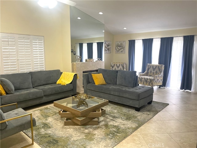 tiled living room with a wealth of natural light