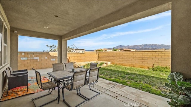 view of patio with a mountain view