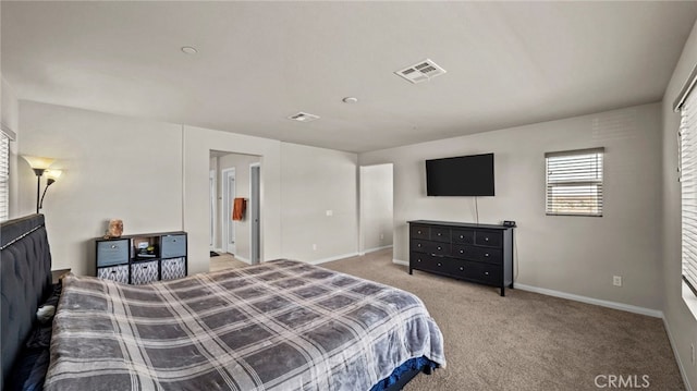 bedroom featuring carpet