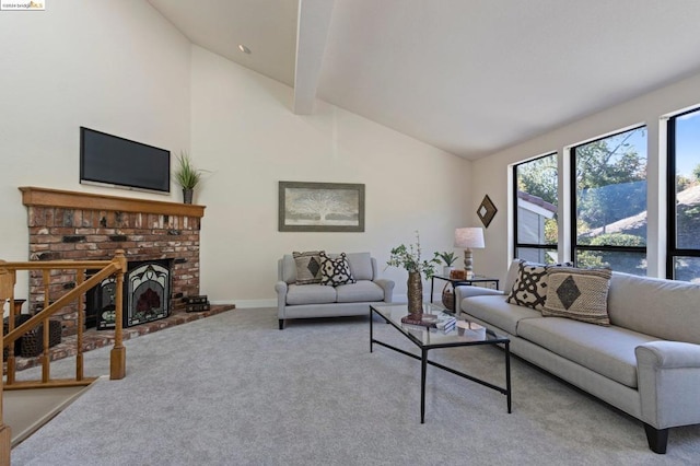 carpeted living room with a fireplace, beam ceiling, and high vaulted ceiling