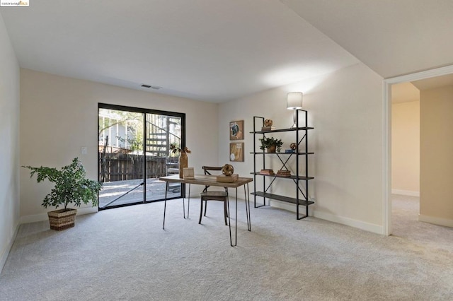 home office with light carpet