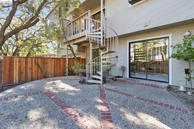 doorway to property featuring a patio