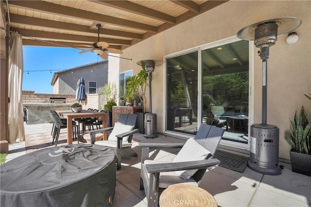 view of patio with ceiling fan