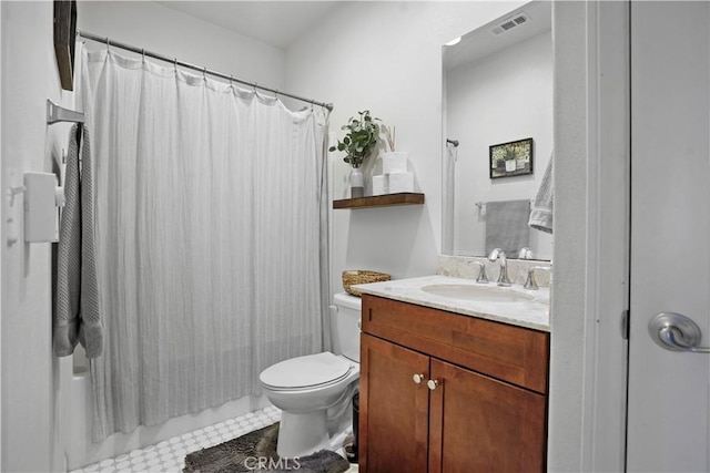 bathroom with a shower with shower curtain, vanity, toilet, and tile patterned flooring