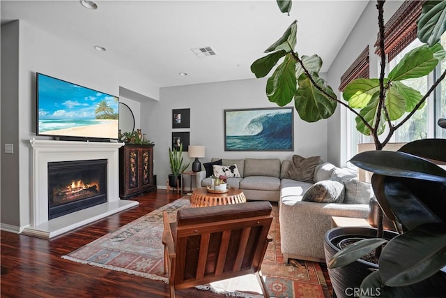 living room featuring dark hardwood / wood-style floors