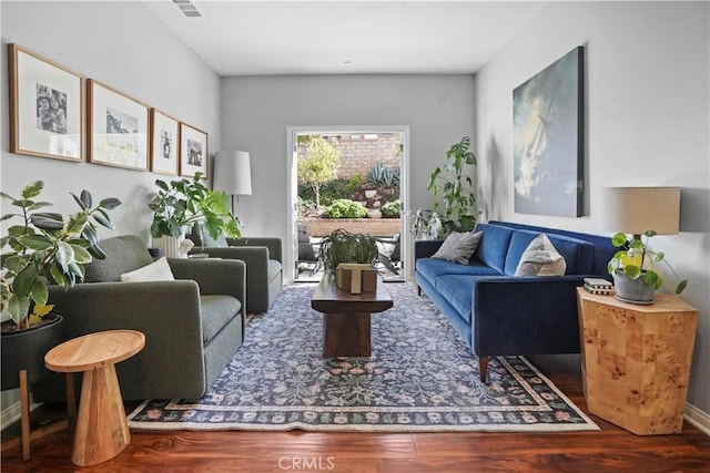 living room featuring wood-type flooring