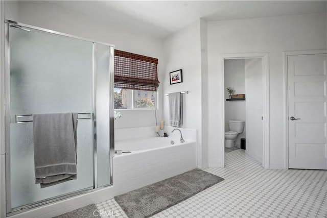 bathroom with shower with separate bathtub and toilet