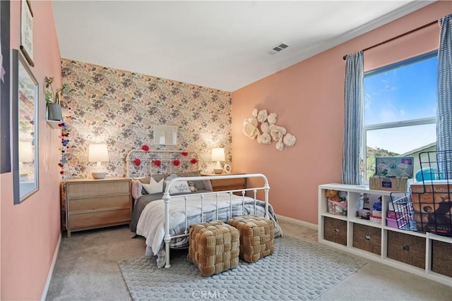 bedroom with light colored carpet