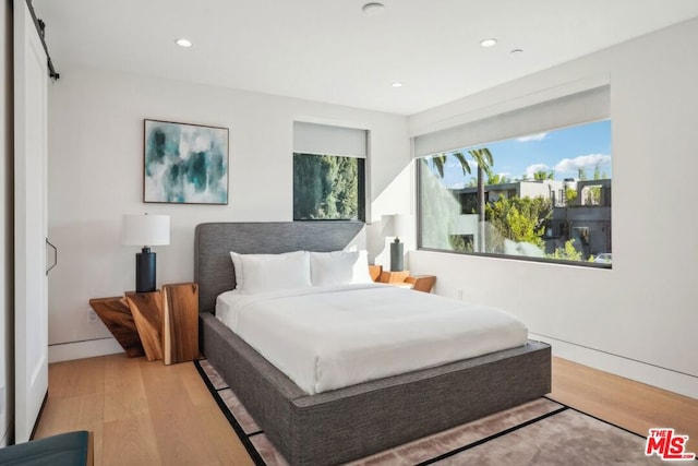 bedroom featuring light hardwood / wood-style flooring