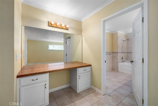 bathroom with tile patterned floors, vanity, ornamental molding, and tub / shower combination